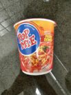 Indomie Pop Mie Mi Instan Cup Kuah Pedes Dower Rasa Ayam Pedas Front